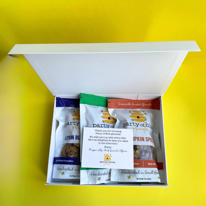 Box of Party at the Hive snacks on a yellow background